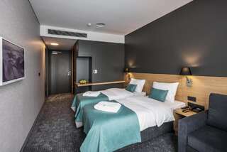 Отель Regatta Hotel Restauracja Spa Познань Двухместный номер Делюкс с 1 кроватью или 2 отдельными кроватями-1
